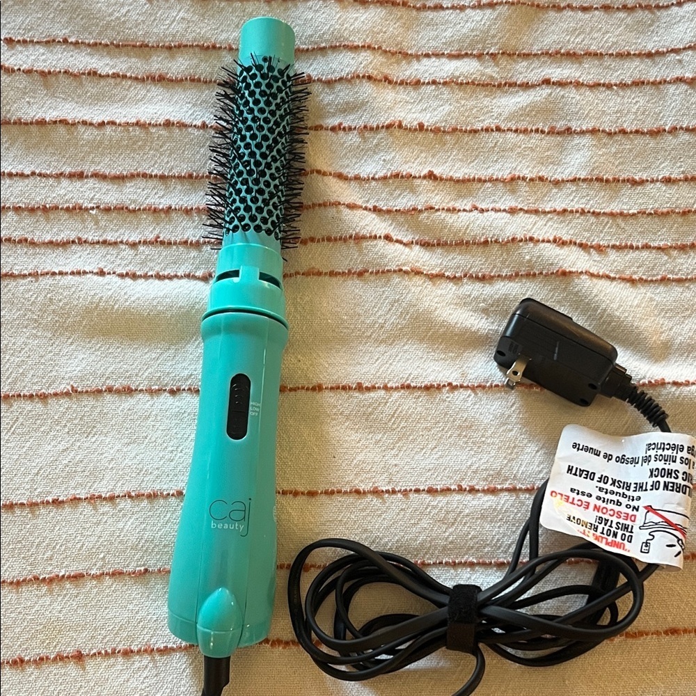 Caj Beauty blow dry styler round brush.